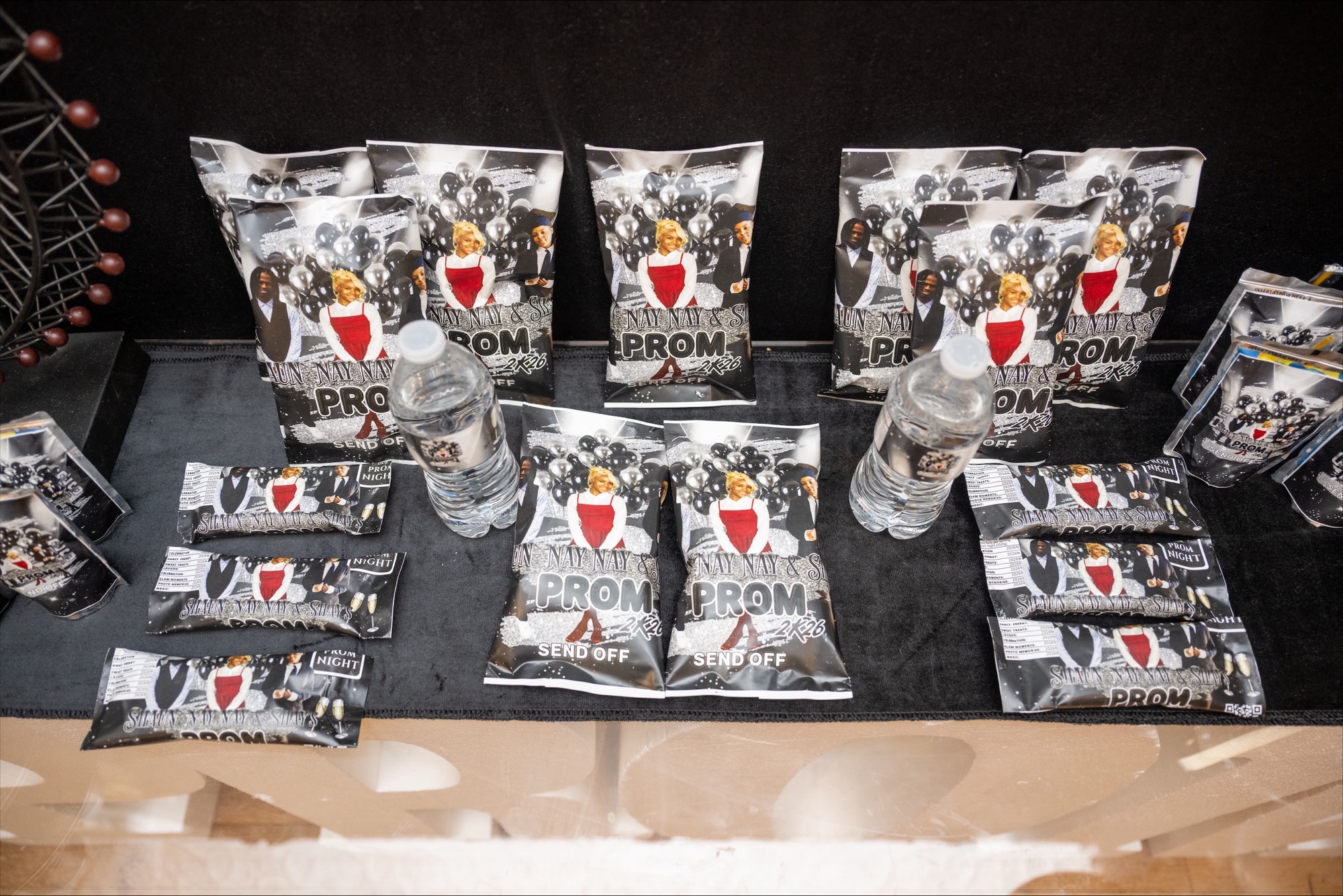 Gallery photo of custom event favors and prom-themed setup